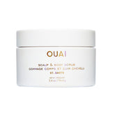 OUAI Scalp & Body Scrub travel-size bottle for on-the-go exfoliation and clean skin.