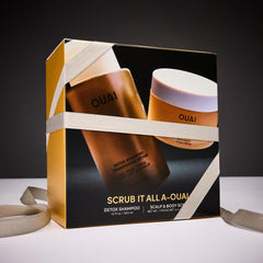 OUAI Scrub It All travel body scrub jar for exfoliating skin on the go.