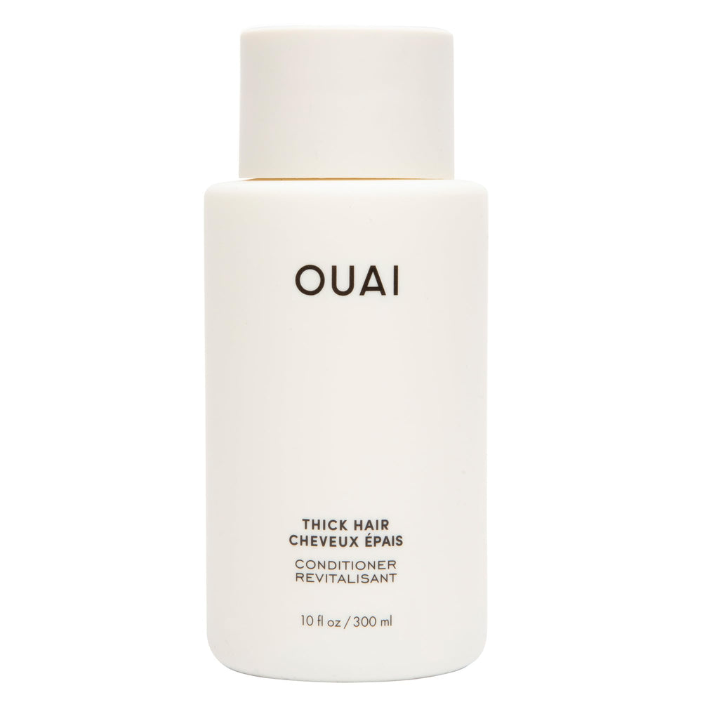OUAI Thick Hair Conditioner bottle shows rich hydration for thick hair.