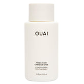 OUAI Thick Hair Conditioner bottle shows rich hydration for thick hair.