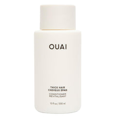 OUAI Thick Hair Conditioner bottle shows rich hydration for thick hair.
