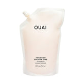 OUAI Thick Shampoo Refill bottle closeup highlighting rich hydration for thick hair