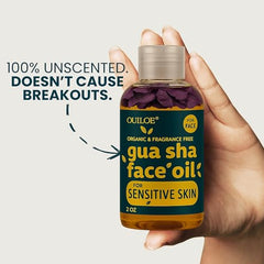 Ouiloe Gua Sha Oil on lymphatic massage scene suggests puffiness reduction potential.