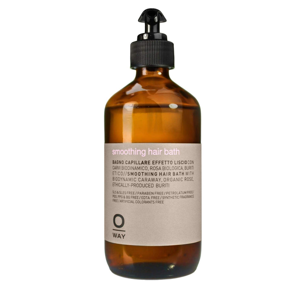 OWAY Smoothing Hair Bath bottle pour showing lightweight cleansing for smoother, manageable hair.