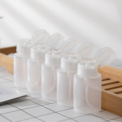 Owlyee push-down pump bottle closeup highlights precise dispensing for acetone and remover