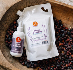 Close-up of ingredients in Oyin Handmade Juices & Berries tonic highlighting detangling moisture.
