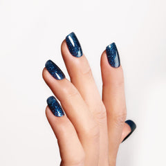 Ozzeal base coat application aiding smooth, even color in at-home manicures