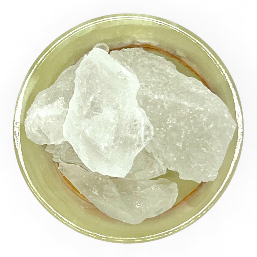Pachamama Essentials alum stone raw crystal shows natural mineral elegance for gentle daily use.