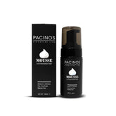 Pacinos Signature Line Curl Enhancing Mousse packaging close-up showing frizz-free promise