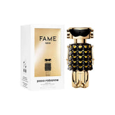 Paco Rabanne Fame Parfum bottle on a vanity for evening allure ritual.