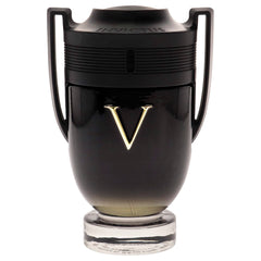 Paco Rabanne Invictus Victory amber-tinge bottle with radiant glow.