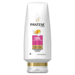 Pantene Pro-V Curl Perfection conditioner bottle closeup for defined, frizz-free curls.