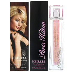 Paris Hilton Heiress 3-4oz bottle sits on a vanity for travel and display.
