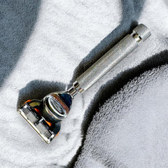 Parker Safety Razor textured-grip shot showing slip-free control on wet hands.