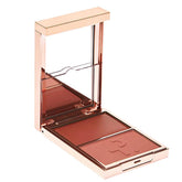 Patrick Ta Major Headlines cream blush compact closeup showing buildable pinky coral glow