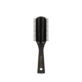 PATTERN Beauty Mini Shower Brush bristles closeup aiding gentle detangling of curls.