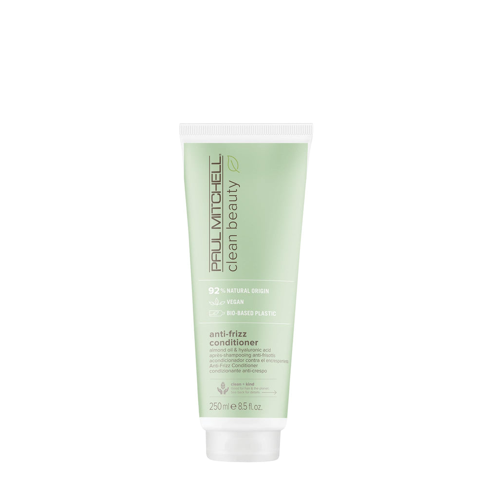 Paul Mitchell Clean Beauty Anti-Frizz Conditioner bottle close-up showing silky, manageable hair.