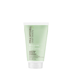 Paul Mitchell Clean Beauty Anti-Frizz Leave-In bottle shows frizz control in action.