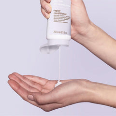 Paul Mitchell Clean Beauty Repair Conditioner pump-dispense enables easy detangling and distribution.