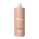 Paul Mitchell Color Protect Shampoo bottle shows color protection and shine benefits.