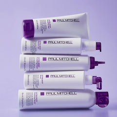 Paul Mitchell Extra-Body Finishing Spray applied to hair for added shine and body.