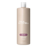 Paul Mitchell Extra-Body Shampoo bottle front shows volume-boosting formula for fine hair.