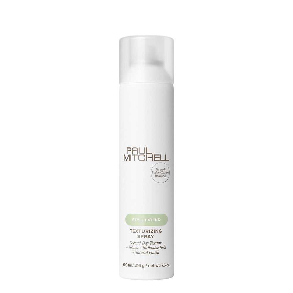 Paul Mitchell Texturizing Spray bottle closeup for defined texture and extended style.