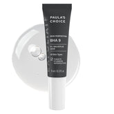 Paula's Choice BHA 9 spot-treatment bottle closeup showing fragrance-free exfoliant for clearer pores