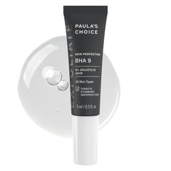 Paula's Choice BHA 9 spot-treatment bottle closeup showing fragrance-free exfoliant for clearer pores
