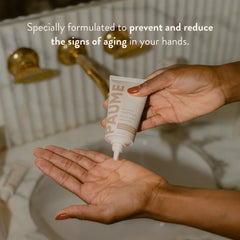 PAUME Renewing Hand Serum being applied to the hand for quick absorption and smoothing.