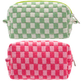 PAZIMIIK checkered makeup bag with flat bottom for easy, hands-free access.