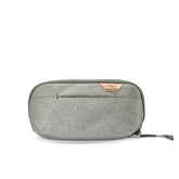Peak Design Small Wash Pouch Sage open showing organized pockets for tidy travel storage