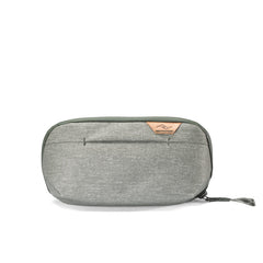 Peak Design Small Wash Pouch Sage open showing organized pockets for tidy travel storage