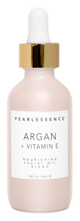 Pearlessence Argan & Vitamin E facial oil bottle promotes deep hydration for balanced skin.