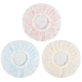 Pengxiaomei waterproof shower cap set rolled for travel and reuse convenience.