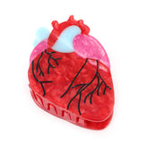 PERSONFUN anatomical heart hair clip close-up, secure grip for thick hair.