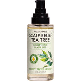 PHARM TO TABLE Tea Tree Hair Oil bottle shows scalp hydration and conditioning.