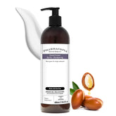Pharmacopia Hotel Argan Oil Conditioner bottle on bathroom shelf delivers hydrated hair.