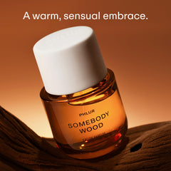 PHLUR Somebody Wood glass bottle vertical view highlights modern shelf appeal and daily wear suitability