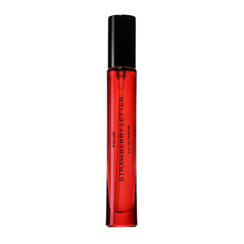 PHLUR Strawberry Letter bottle close-up, on-the-go luxury for daily wear.