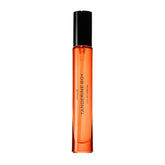 PHLUR Tangerine Boy travel-size bottle showing bold citrus scent for on-the-go use