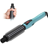 PHOEBE curling iron brush creating natural curls effortlessly.