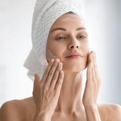 Photozyme DNA Youth Recovery Serum natural-ingredients bottle highlighting hydrating formula.
