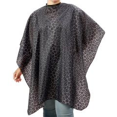 Plum Hill waterproof black leopard cape front view protects clients during haircuts