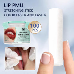 PMUBEAUTY lip tattoo stretching stick used during precise lip coloring for clean results.