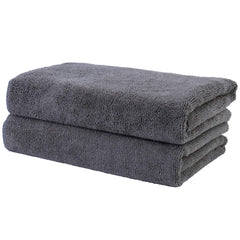 POLYTE quick-dry towel folded in dark gray showing plush microfiber for gentle drying