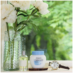 Pond's Dry Skin Cream packaged box emphasizes gentle, dermatologist-tested hydration.