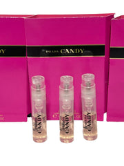 Prada Candy sample vial close-up highlighting caramel accord and warmth.