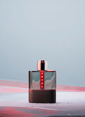 Prada Luna Rossa Carbon bottle angled view captures modern sport-chic lines.