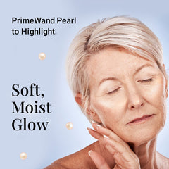 Prime Prometics PrimeWand Pearl cheek highlight on apple for natural radiance.